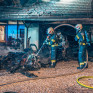 Elektrofahrzeug in Garage in Vollbrand